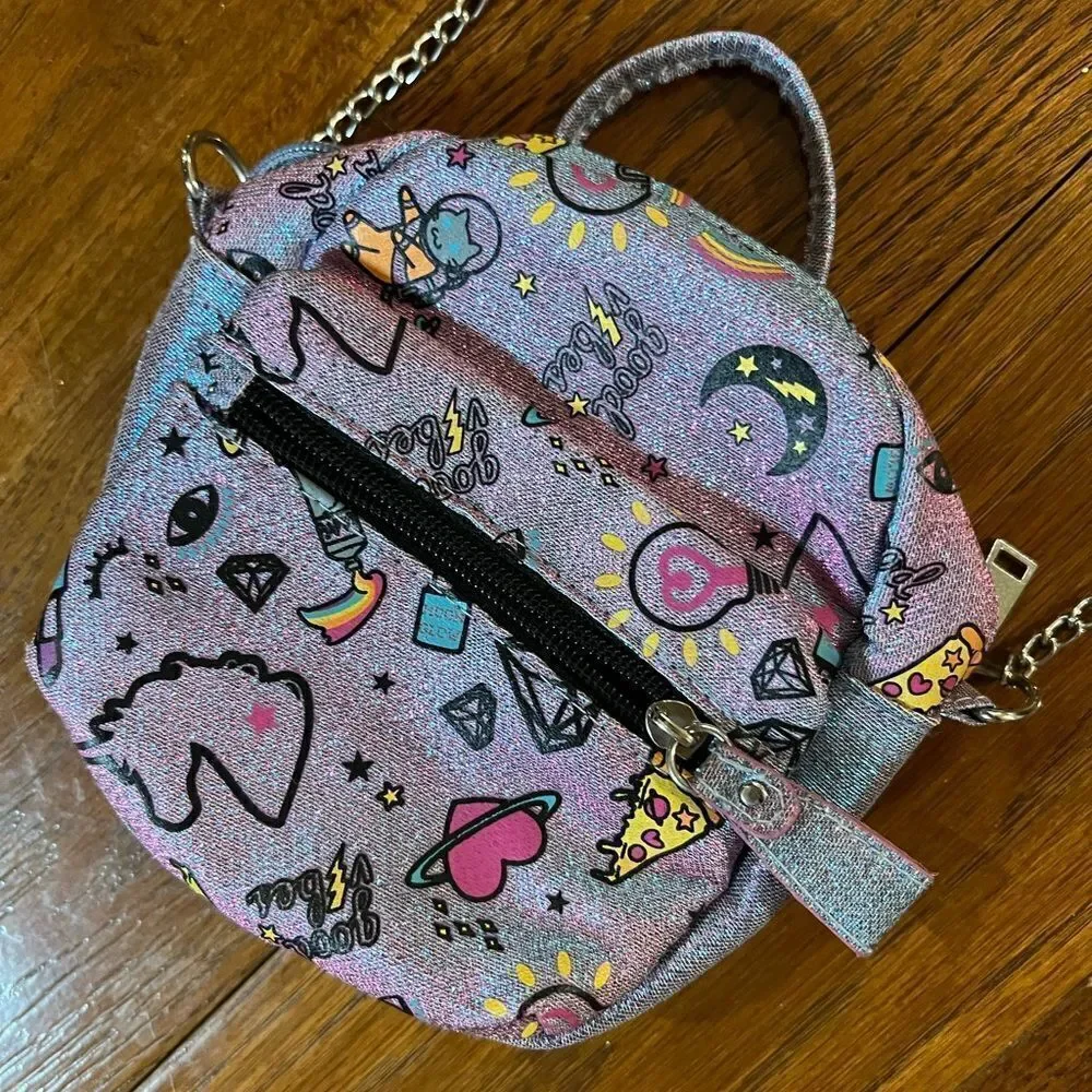 Gorgeous Glittery & metallic purple/blue w/graphics square Claire’s crossbody